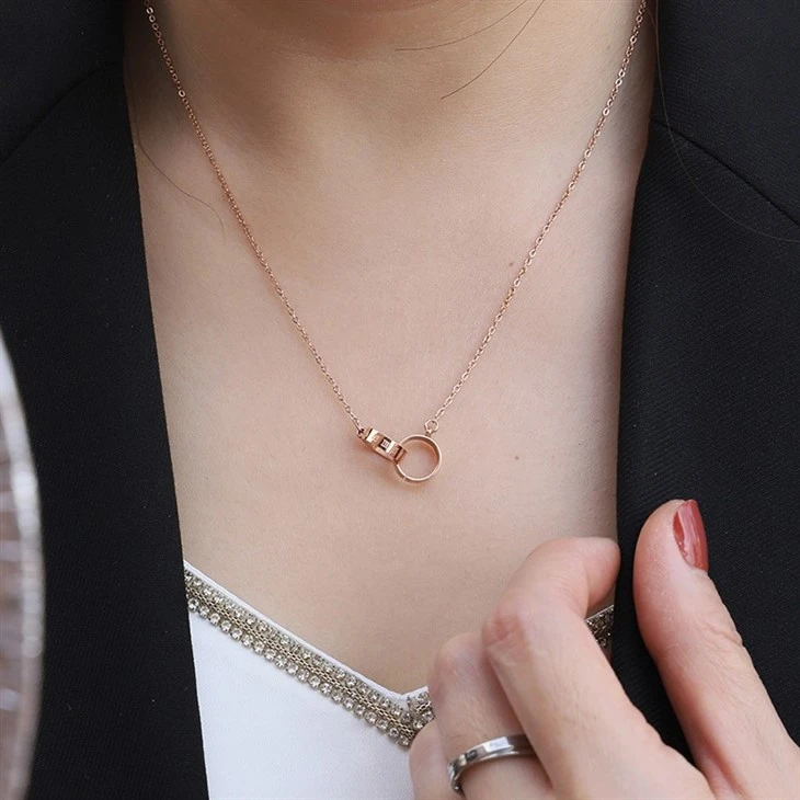 Rose Gold Roman Numeral Double Ring Interlocking Pendant Necklace price